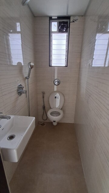 Bathroom in 2 BHK Apartment at Hubtown Harmony, Matunga – for Rent