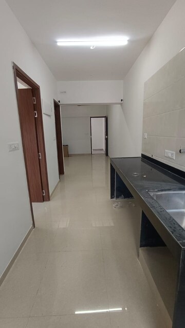 Kitchen in 1.5 BHK Apartment at Rama Metro Life Optima, Tathawade – for Rent
