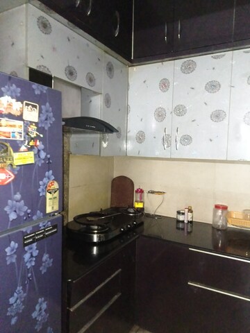 Kitchen in 1 BHK Apartment at Aims Golf City, Sector 75 – for Rent