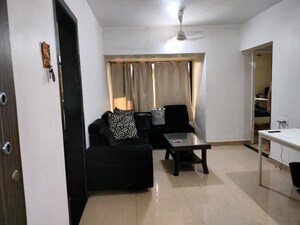 Living Room in 2 BHK Apartment at Kanchan Junga Tower, Kopar Khairane – for Sale