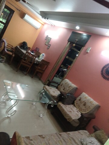 Living Room in 1 BHK Apartment at Aims Golf City, Sector 75 – for Rent