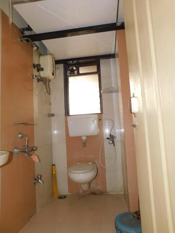 Bathroom in 2 BHK Apartment at Aman Spring, Kandivali West – for Rent