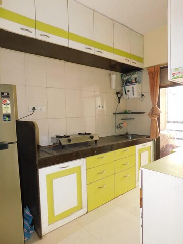 Kitchen in 2 BHK Apartment at Aman Spring, Kandivali West – for Rent