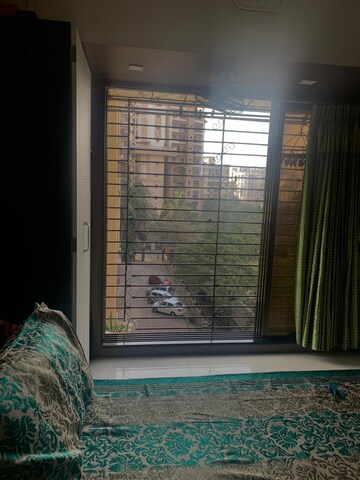 Bedroom in 1 BHK Apartment at Neel Sarovar, Andheri East – for Sale