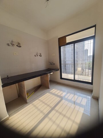 Kitchen in 1 BHK Apartment at Raj Tulsi Aadvik, Badlapur East – for Rent