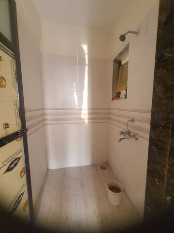 Bathroom in 1 BHK Apartment at Raj Tulsi Aadvik, Badlapur East – for Rent