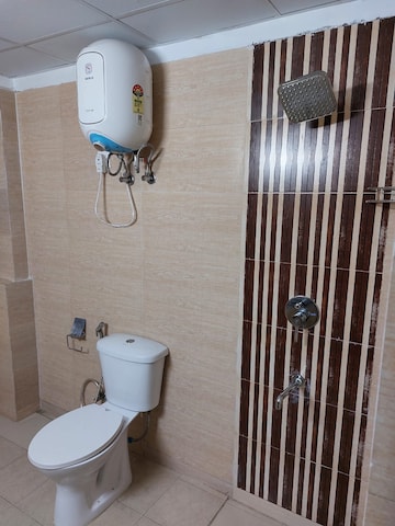 Bathroom in 4 BHK Apartment at Godrej Tropical Isle, Sector 146 – for Sale