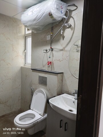 Bathroom in 2.5 BHK Builder Floor at Smart World Gems, Sector 89 – for Rent