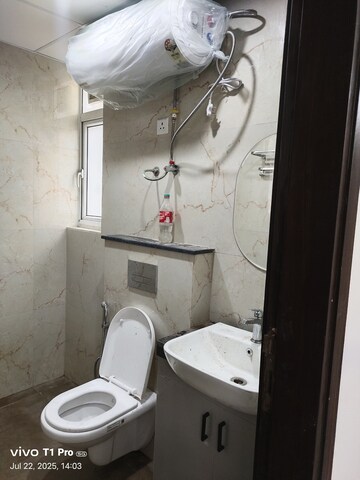 Bathroom in 2.5 BHK Builder Floor at Smart World Gems, Sector 89 – for Rent