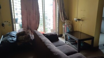Living Room in 1 BHK Apartment at Siddhi Highland Park, Kolshet Road – for Rent