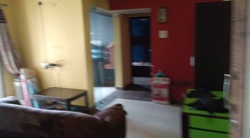 Living Room in 1 BHK Apartment at Siddhi Highland Park, Kolshet Road – for Rent