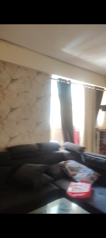 Living Room in 2 BHK Apartment at Proview Officer City, Raj Nagar Extension – for Sale