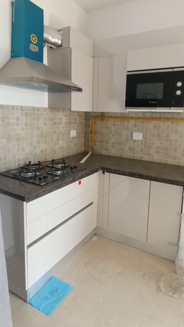 Kitchen in 4 BHK Apartment at Godrej Woods, Sector 43 – for Rent
