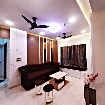 Living Room in 2 BHK Apartment at Lodha Amara, Kolshet Road – for Sale