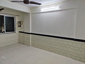 Kitchen in 1 BHK Apartment at Kirtikar CHS, Ganeshwadi – for Sale