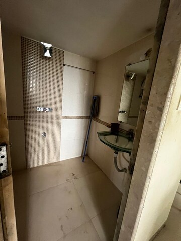 Bathroom in 2 BHK Apartment at Dedhia Palatial Height, Powai – for Rent