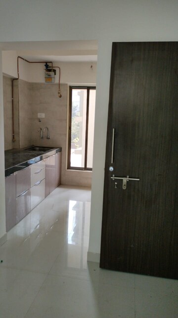 Kitchen in 2 BHK Apartment at K L Lotus Niwas Satya Niwas, Malad West – for Rent