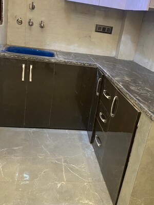 Kitchen in 3 BHK Builder Floor at Aya Nagar – for Sale