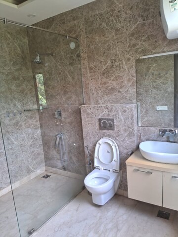 Bathroom in 3 BHK Apartment at Unitech Uniworld Gardens 2, Sector 47 – for Rent