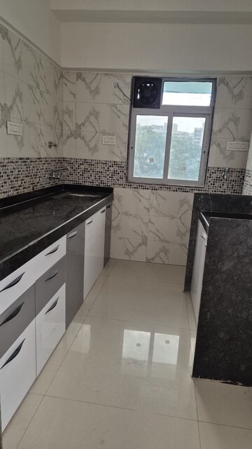 Kitchen in 2 BHK Apartment at Group Seven Rushi Heights, Goregaon East – for Rent