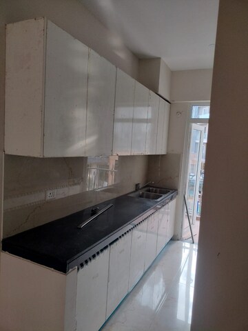 Kitchen in 3.5 BHK Builder Floor at Smart World Gems, Sector 89 – for Rent