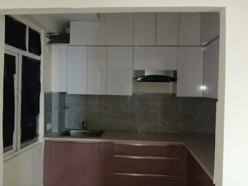 Kitchen in 2 BHK Apartment at Mahagun Mywoods, Sector 16c Greater Noida – for Rent
