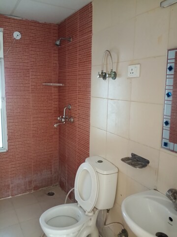 Bathroom in 2 BHK Apartment at Mahagun Mywoods, Sector 16c Greater Noida – for Rent
