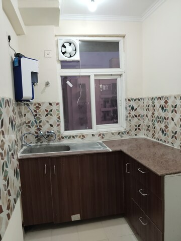 Kitchen in 2.5 BHK Apartment at Amrapali Leisure Park, Amrapali Leisure Valley – for Rent