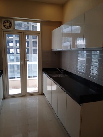 Kitchen in 3.5 BHK Apartment at Omkar Alta Monte, Malad East – for Rent