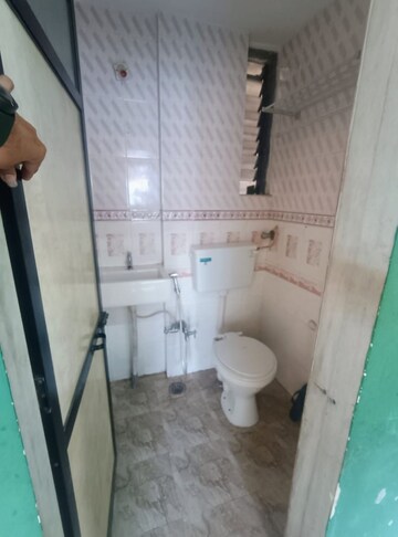 Bathroom in 1 BHK Apartment at Kopar Khairane – for Sale