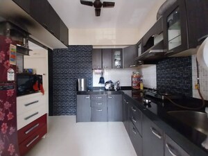 Kitchen in 2 BHK Apartment at Good Will Paradise, Kharghar – for Sale