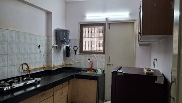 Kitchen in 2 BHK Apartment at Thaltej – for Rent