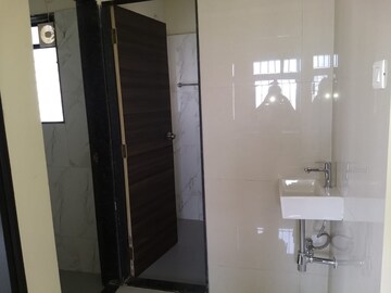 Bathroom in 1 BHK Apartment at Dosti Desire Joy, Brahmand – for Sale