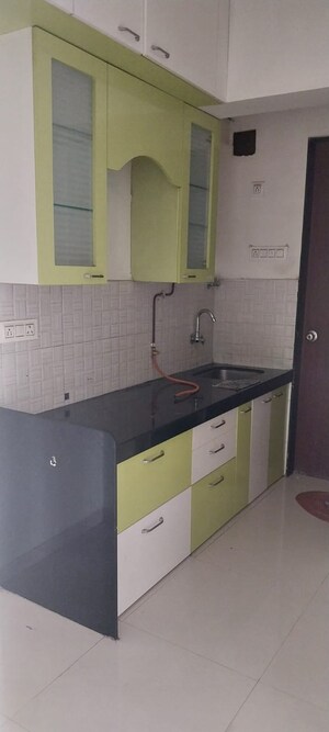 Kitchen in 1 BHK Apartment at Bhoomi Acres, Waghbil – for Sale