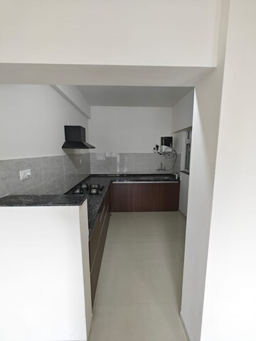 Kitchen in 3 BHK Apartment at Gera World of Joy, Kharadi – for Rent