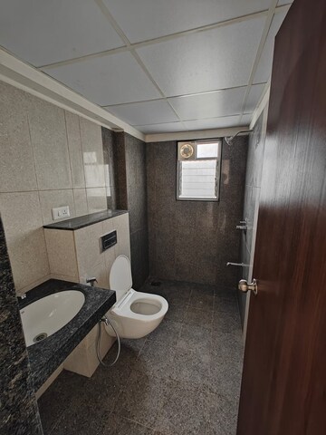 Bathroom in 3 BHK Apartment at Gera World of Joy, Kharadi – for Rent