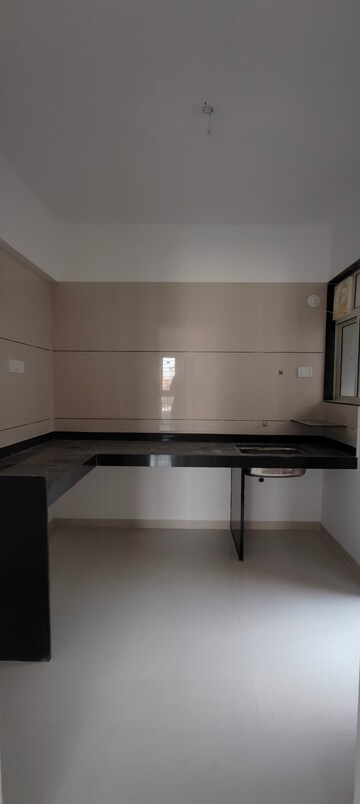 Kitchen in 2 BHK Apartment at Kanchan Royal Exotica, Kondhwa – for Rent