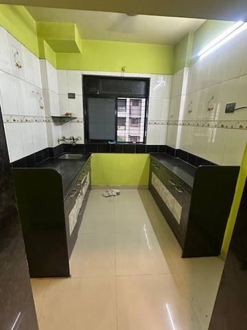 Kitchen in 1 BHK Apartment at Dombivli West – for Sale