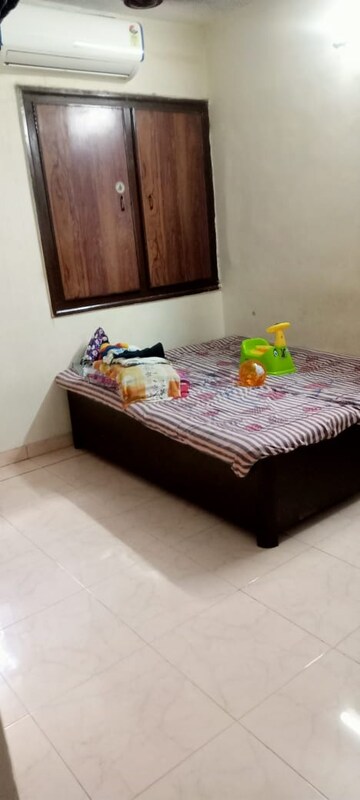 Bedroom in 1 BHK Apartment at Snehdhara CHS, Vile Parle West – for Rent