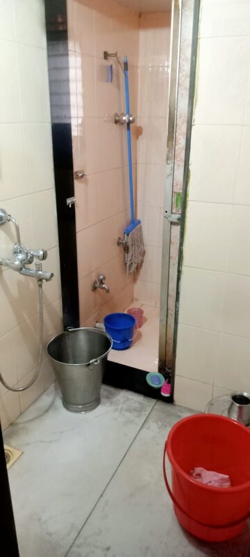 Bathroom in 1 BHK Apartment at Snehdhara CHS, Vile Parle West – for Rent