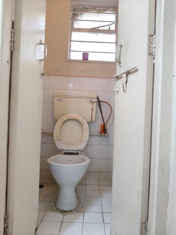 Bathroom in 1 BHK Apartment at Amrapalishree CHS, Kalyani Nagar – for Rent