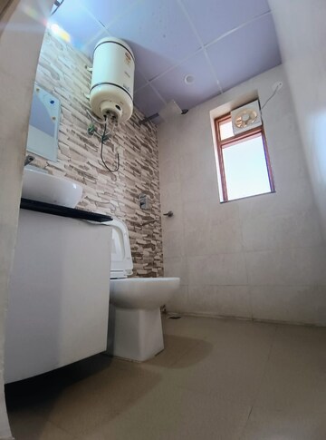 Bathroom in 3 BHK Builder Floor at RWA Residential Society Sector 46, Sector 46 – for Rent