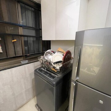 Kitchen in 4 BHK Apartment at Rustomjee Crown, Gokhale Road – for Rent