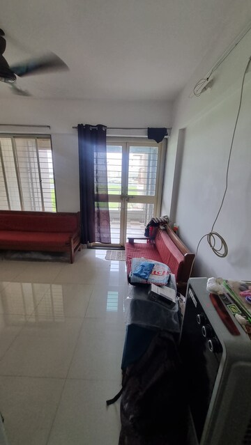 Living Room in 1 BHK Apartment at United Arise, Lohgaon – for Rent