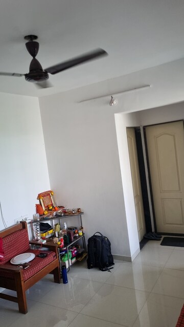 Living Room in 1 BHK Apartment at United Arise, Lohgaon – for Rent