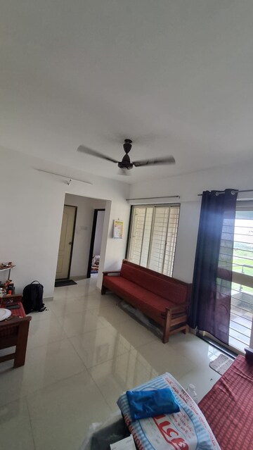 Living Room in 1 BHK Apartment at United Arise, Lohgaon – for Rent