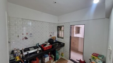 Kitchen in 1 BHK Apartment at United Arise, Lohgaon – for Rent