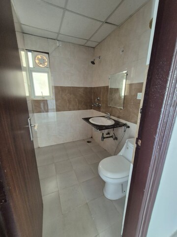 Washroom in 3.5 BHK Apartment at ATS Green II, Sector 50 – for Rent
