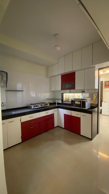 Kitchen in 2 BHK Apartment at Kamal Van CHS, Kandivali West – for Sale