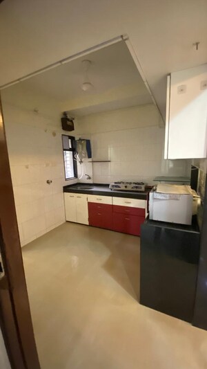 Kitchen in 2 BHK Apartment at Kamal Van CHS, Kandivali West – for Sale